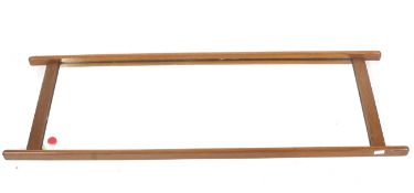 A mid-century full length wall mirror.