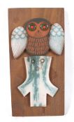 A Hornsea Muramic handcrafted wall plaque.