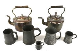 Five 19th century and later pewter tankards and two copper kettles.