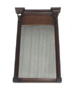 Framed wall mirror.