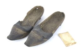 A pair of antique Eastern shoes. With wooden frames and leather straps, L28.
