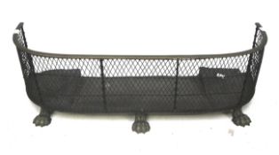 A Regency fire curb.