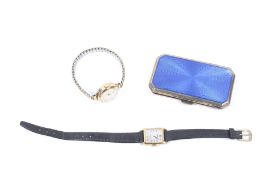 An early 20th century silver cigarette case and two lady's wrist/bracelet watches.