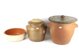 Three large pieces of stoneware.