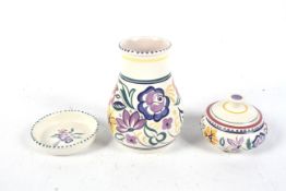 Three pieces of Poole pottery.