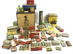 A collection of assorted vintage product advertising tins.