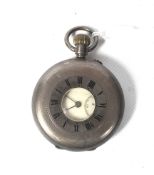 A silver cased half hunter pocket watch.