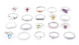 Twenty silver and white metal rings.