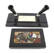 A 20th century cast metal desk stand and a slate paperweight.