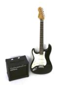 An Encore 'Blaster' series left handed electric guitar and amp.