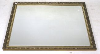 A contemporary bevelled edge wall mirror.