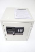 A Sentry S3817 combination key safe and instruction booklet. Key present, comb.