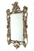 A contemporary gilt framed wall mirror.