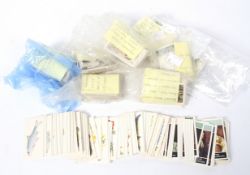 A collection of cigarette trading cards.