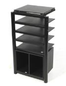 A contemporary freestanding Hi Fi separates music stand.