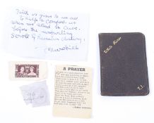 Two commemorative stamps and a small section of collectables.