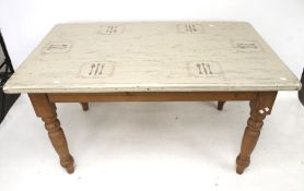A contemporary pine kitchen dining table.
