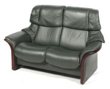 An Stressless twin recliner settee.