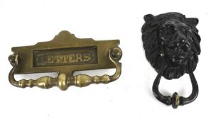 Two items of vintage brass door furniture.