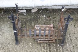 A vintage cast iron fire basket.