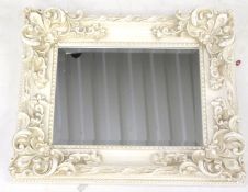 A bevelled edge wall mirror.