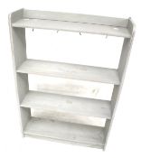 A wooden freestanding bookcase.