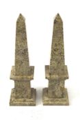 A pair of sedimentary stone obelisks.