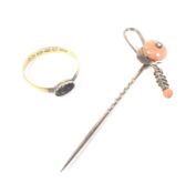 A Victorian 22ct wedding band with a later applied metal stone collett,