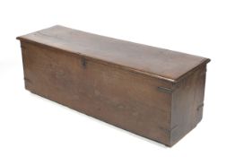 A 16 th/17th century low oak coffer with candle box.
