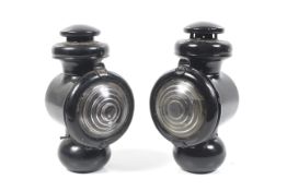 Two automobilia lamps.