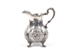 A Victorian silver baluster shaped milk jug.