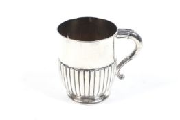 A Victorian silver part fluted christening mug.