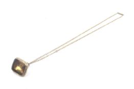 A 19th century gold and foil-backed citrine fob seal head.