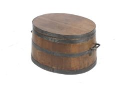 An unusual early 20th century iron banded Pig Salter of oval shape.