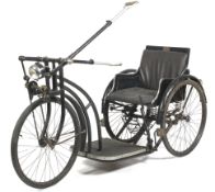 A self-propelled invalid carriage or tricycle by Lely, The Hague, Netherlands.