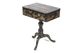 A Georgian Chinoiserie tripod work table.