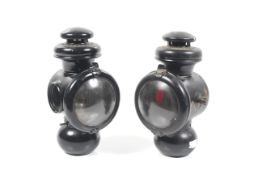 Two automobilia lamps.