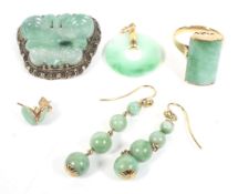 A small collection of jadeite jewellery including a ring. The rectangular domed panel approx. 19.