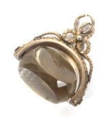 An early 19th century gold and citrine spinning fob.