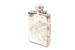An early 20th century silver concave-oblong half-pint spirit or hip flask.