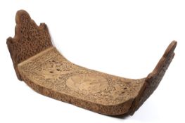 An Indonesian carved hardwood stool seat (no legs).