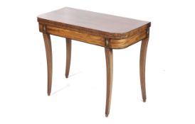 A Regency mahogany fold over tea table.