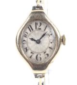 A Swiss 14ct gold tonneau-shaped bracelet watch, circa 1930.