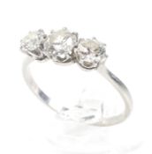 An early-mid 20th century diamond three stone ring. The old-cut and transition-cut stones approx. 1.