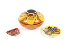 Three mid-century Poole Pottery Delphis items.
