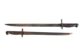 A Remington model 1913 bayonet and a similar example.