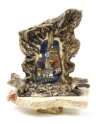 A 20th century Studio Art Pottery sculpture. With guitar and castle decoration on plinth.