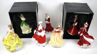 Seven Royal Doulton and Coalport figures.