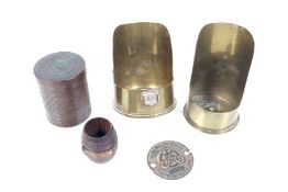 A collection of Trench Art items.