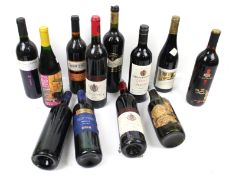 Twelve bottles of red wine.